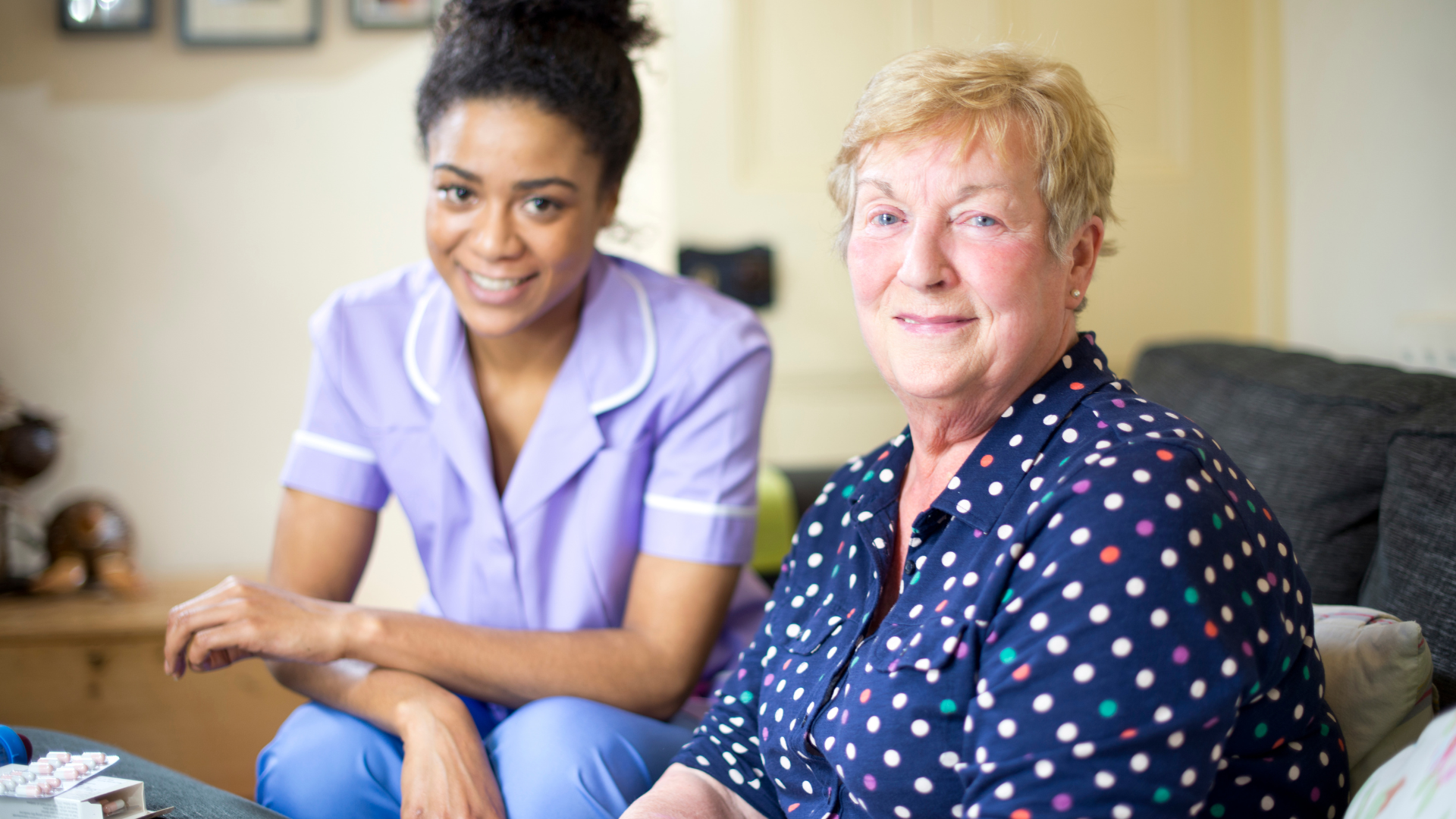 A smiling care assistant